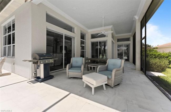 View of patio / terrace featuring a grill and a ceiling fan | Image 19