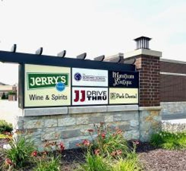 Jerry's Plaza just down the road. A grocery store, postal service, Starbucks, full deli service and more! | Image 24