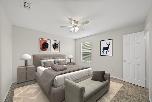 Bedroom with light colored carpet and a ceiling fan | Image 34