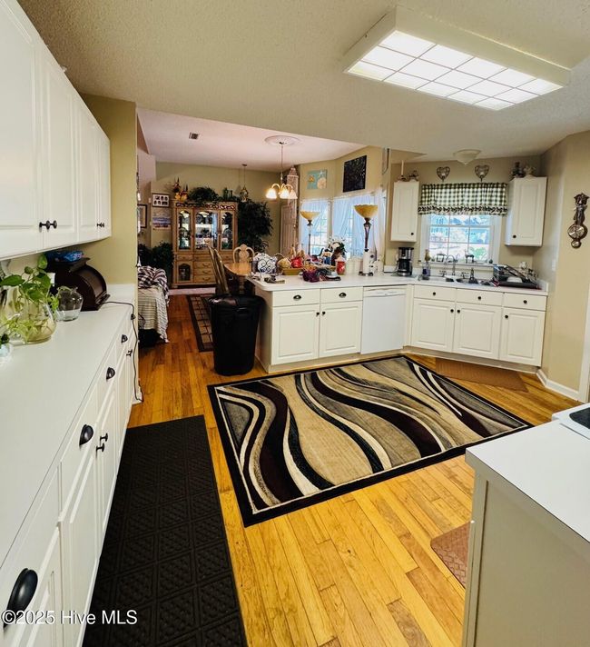The only appliances that stay are the stove and vent/hood. | Image 7