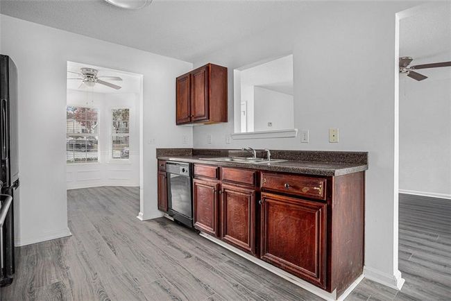 6876 Wildboar Dr, House other with 4 bedrooms, 3 bathrooms and 4 parking in Fairburn GA | Image 8