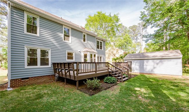 Back of property featuring a yard and a deck | Image 47