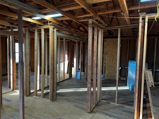looking form the Kitchen to the Laundry / back entry and the built in fridge hole. | Image 25
