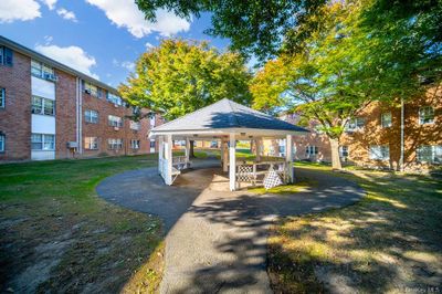 View of home's community with a gazebo and a lawn | Image 1