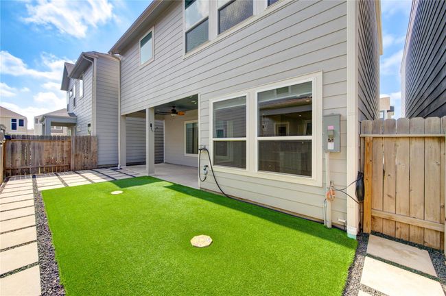 Professionally landscaped outdoor entertaining area, low maintenance. | Image 33