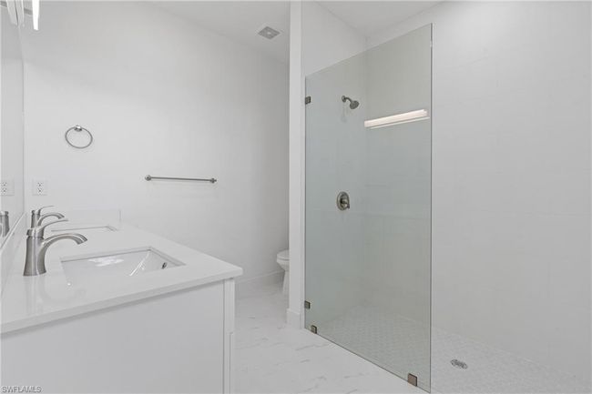 3129 71 St St W, House other with 3 bedrooms, 2 bathrooms and 2 parking in LEHIGH ACRES FL | Image 24