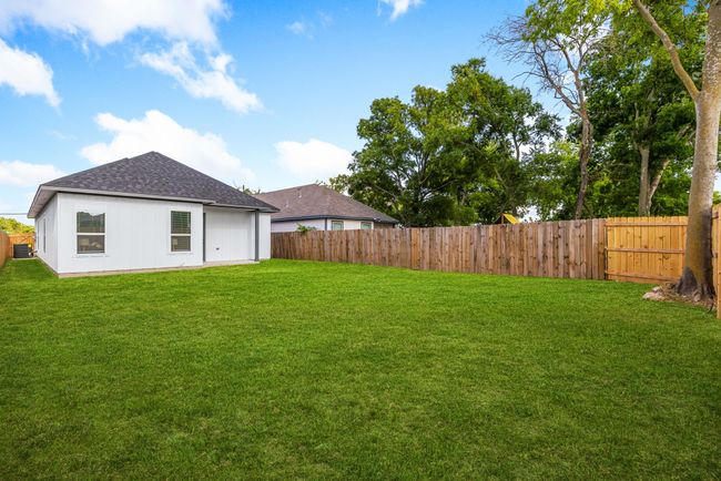 View of yard featuring a fenced backyard | Image 26