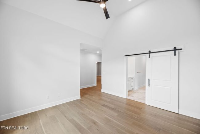 Sliding Door Leads To The Primary Bath | Image 25