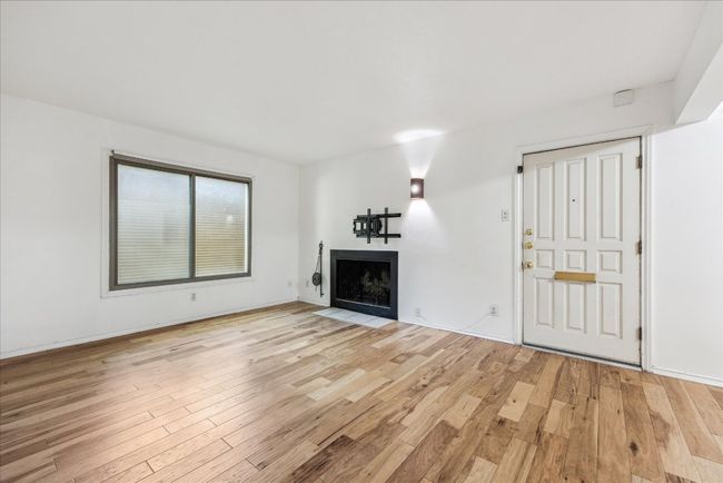 Beautiful wood floors invite you in | Image 6