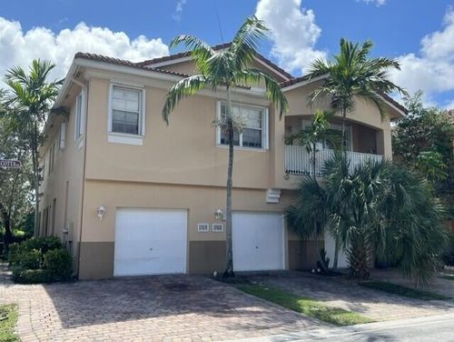 1704 Terra Cotta Dr, Riviera Beach, FL, 33404-1861 | Card Image