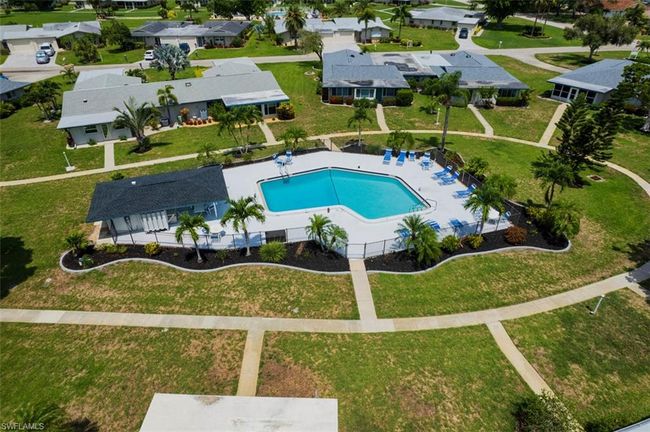 Aerial perspective of suburban area with a pool | Image 7