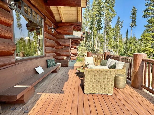 Wrap around deck additional sitting area, summer. | Image 86