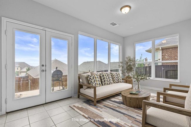 Sunroom featuring french doors | Image 7
