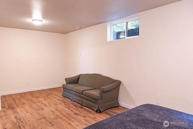 One of 2 large bonus rooms downstairs. This would be a perfect work-out room or play room. The other bonus room (currently being used for storage) would be a nice office or theater room. | Image 18