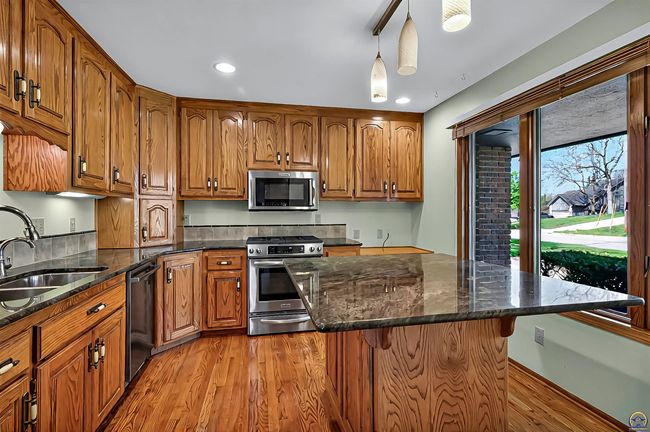 3835 Sw Wood Valley Dr, House other with 5 bedrooms, 3 bathrooms and null parking in Topeka KS | Image 6
