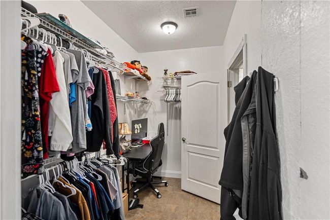 View of spacious closet | Image 27