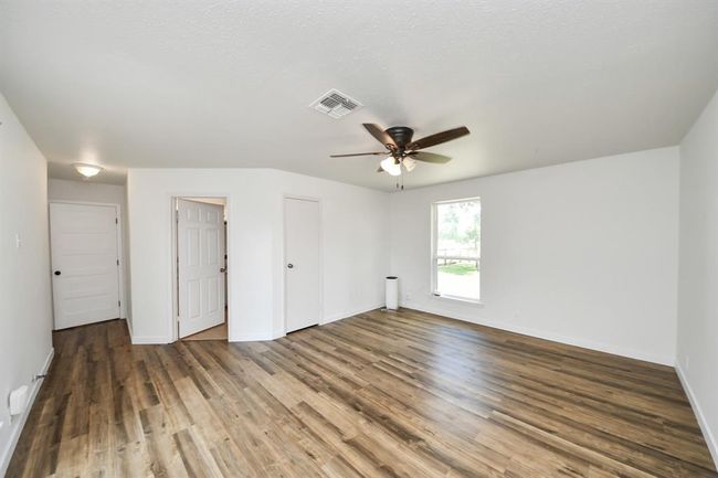 Spacious second primary suite with a large walk-in closet and private bath—ideal for multi-generational living or a luxurious guest retreat. | Image 22
