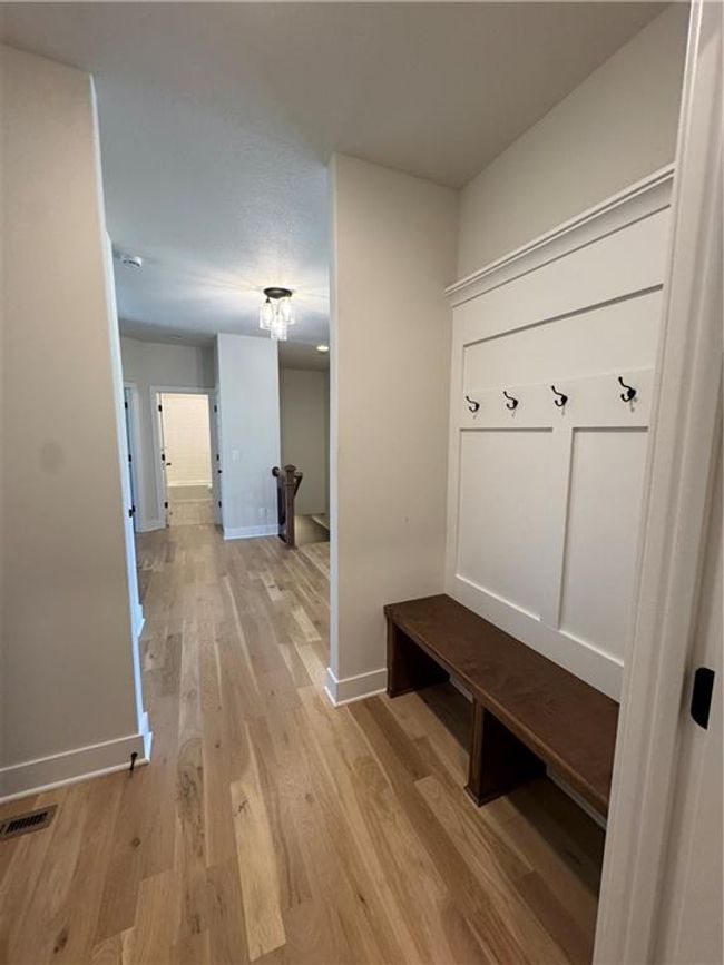 Mudroom featuring baseboards and light wood finished floors | Image 44