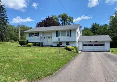 Split foyer home with a front yard | Image 1