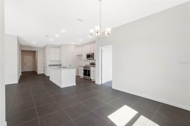 8928 Nuthatcher Dr, House other with 3 bedrooms, 2 bathrooms and null parking in LEESBURG FL | Image 21