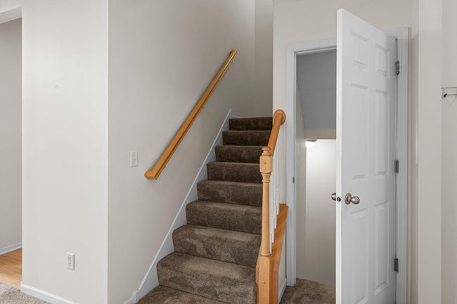 Staircase going upstairs and open the door to go downstairs. | Image 21