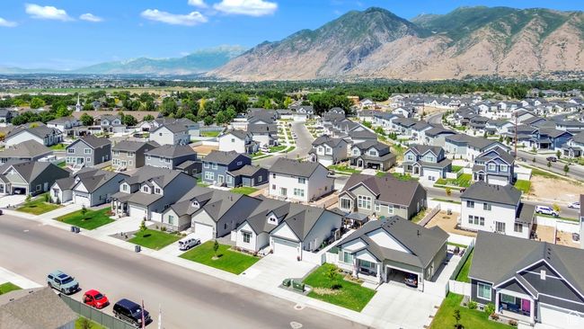 Aerial view of residential area featuring a mountainous background | Image 37