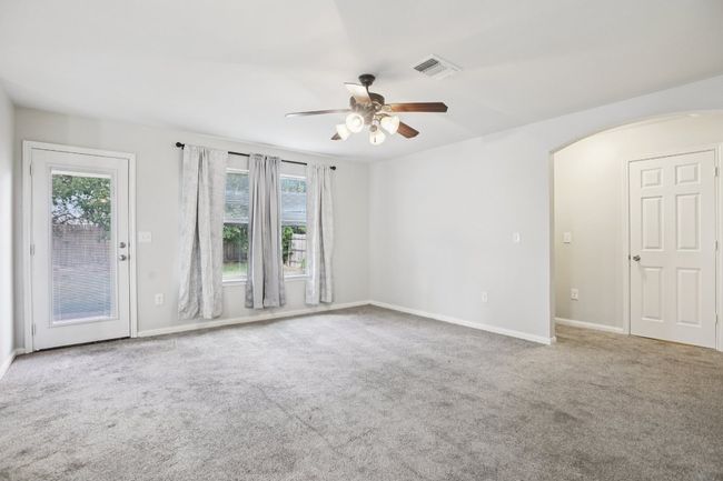 Hallway to stairs, 1/2 bath and Laundry Room | Image 8