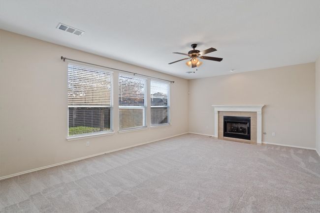 Living room with fireplace | Image 6