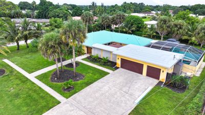 3043 Se Pine Valley Street, House other with 4 bedrooms, 3 bathrooms and null parking in Port St Lucie FL | Image 1