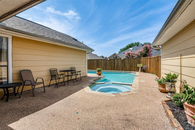 Back patio and pool. | Image 24