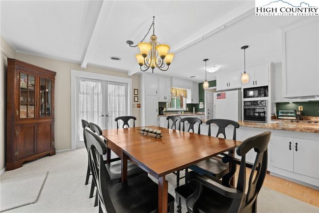 The floorplan allows plenty of interaction with family and friends while entertaining. | Image 15