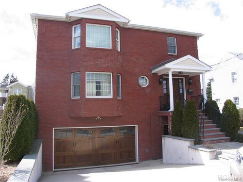 front-40 Ellsworth Ave, Harrison, NY, 10528-3111 | Card Image