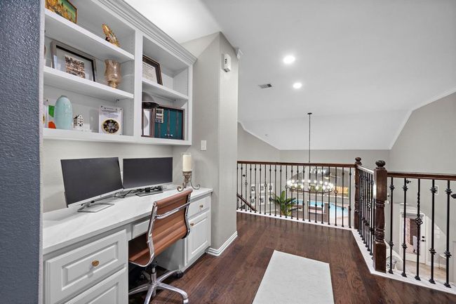 Built-in desk with shelving. Great for homework or a second workspace. | Image 31