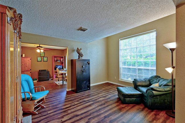 Versatile space: formal dining area currently set up as an office. | Image 6