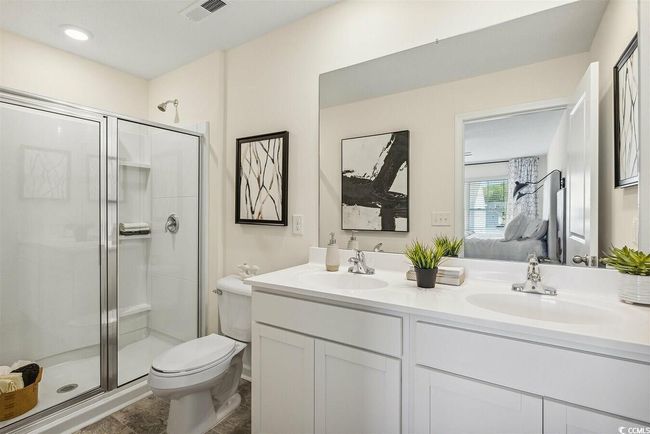Ensuite bathroom with a shower stall and double vanity | Image 23