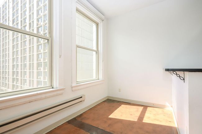 So much light! Add a dining table here, or maybe mount a tv on this wall. | Image 12