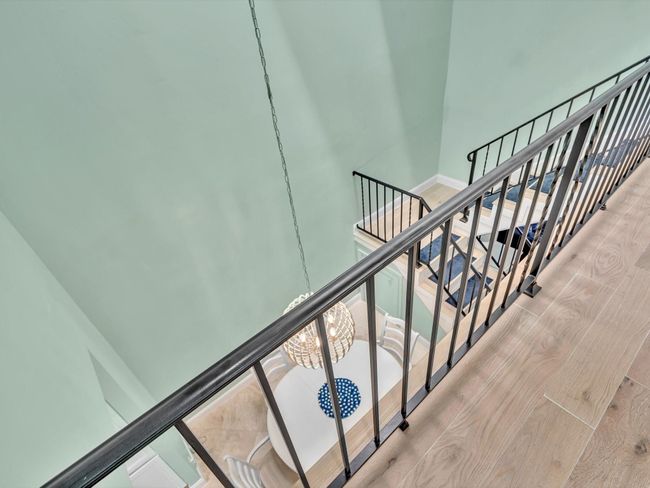 2nd floor elevator landing and hallway splits the 2 master bedrooms | Image 50