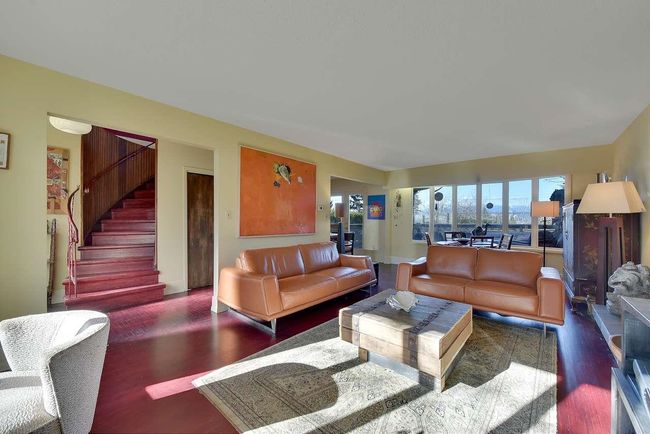 Living area featuring wood finished floors and stairway | Image 8
