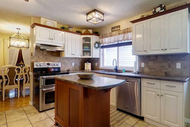 908 14 Avenue Se, Home with 4 bedrooms, 2 bathrooms and 5 parking in Slave Lake AB | Image 6