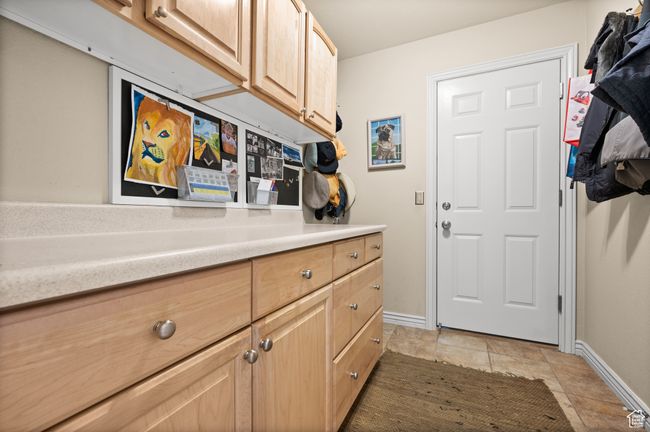 Mud room featuring light tile patterned floors | Image 15