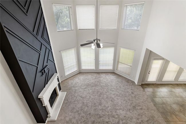 View from second floor into main living room | Image 28