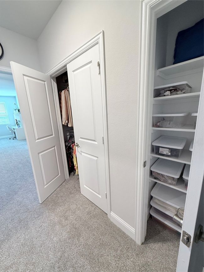 Primary suite view of closet | Image 12