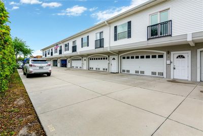 Assigned 1 Parking Spot per Condo Unit - Plus 2 Car Garage | Image 2