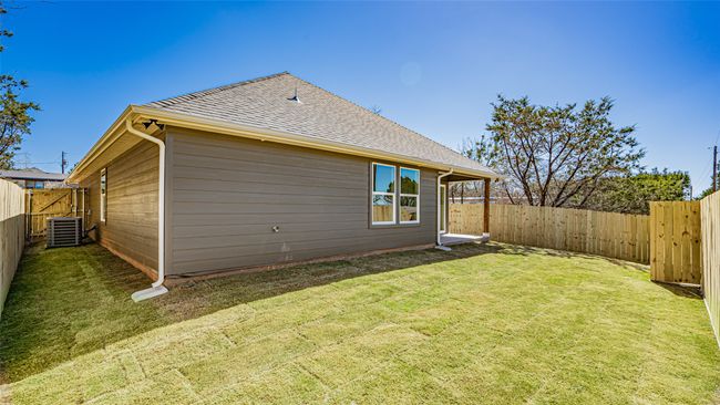 Completely fenced and sodded back yard | Image 27