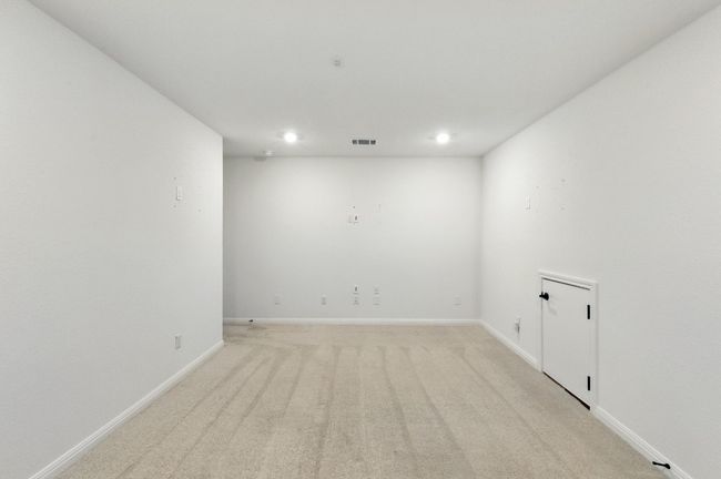 Unfurnished room featuring recessed lighting, light carpet, and baseboards | Image 28