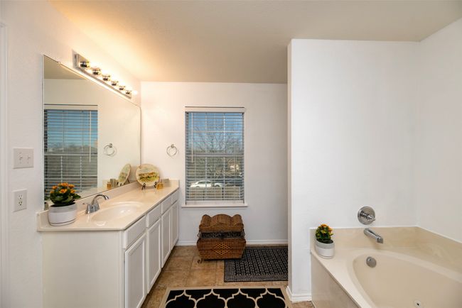 New Carpeted empty room featuring baseboards and ceiling fan | Image 22