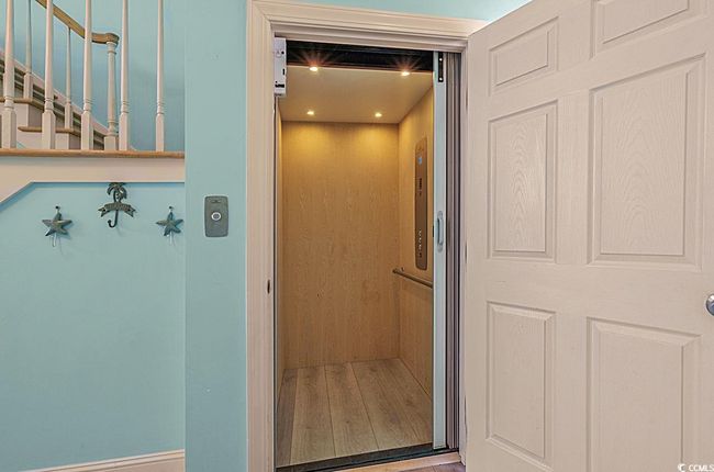 Interior details featuring recessed lighting and elevator | Image 30
