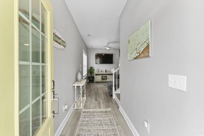 Corridor with hardwood / wood-style floors | Image 2