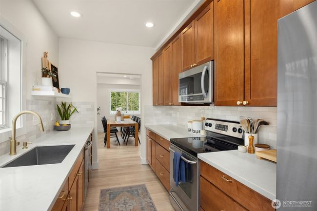 A very functional galley style kitchen. | Image 12
