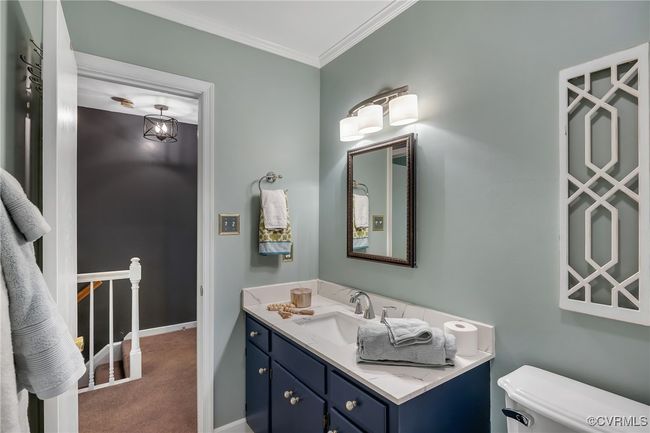 Bathroom with vanity, crown molding | Image 26